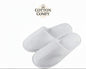 White bathroom slippers with 'Cotton Comfy' branding on a white background